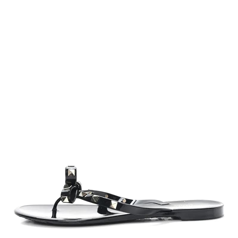 Valentino Garavani — PVC Jelly Rockstud Bow Thong Sandals 40 Black — Designer Shoe — resale