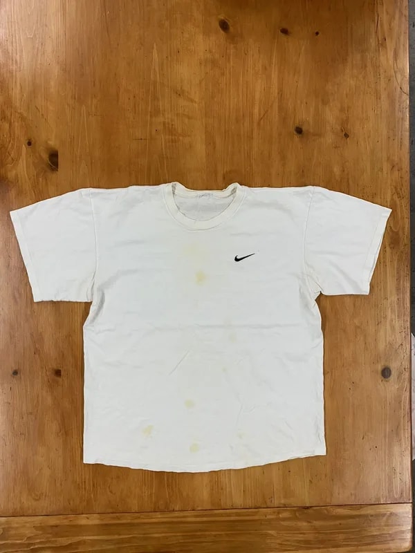 Nike — Nike T-shirt Stained — streetwear — resale