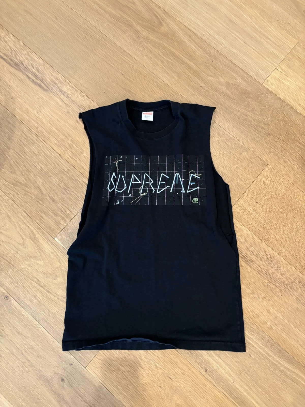 Supreme — Supreme Tag Cutoff Tank Top — streetwear — resale
