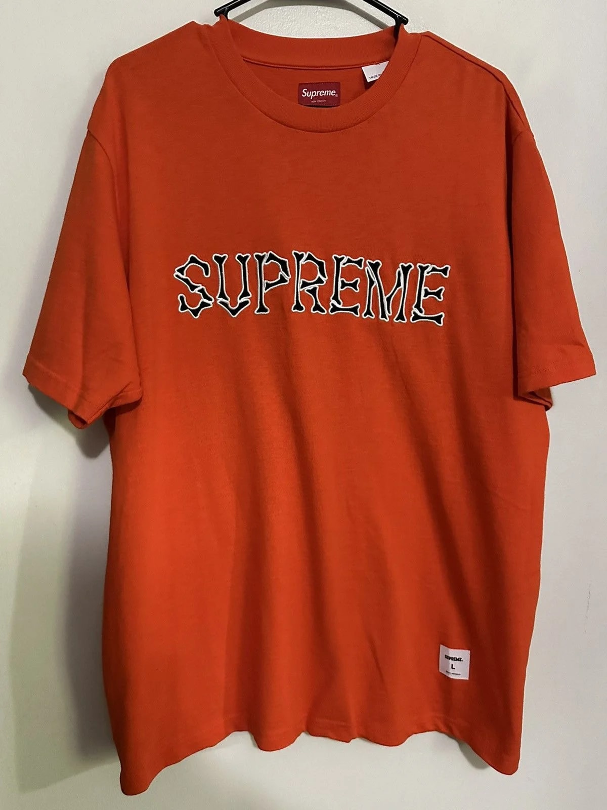 Supreme — Supreme Bones S/S Top Tee — streetwear — resale