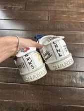 Chanel Pharrell Low Top Lace-Up CC 4