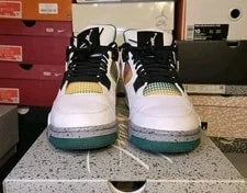 Air Jordan 4 Retro "Rasta" Shoes 3