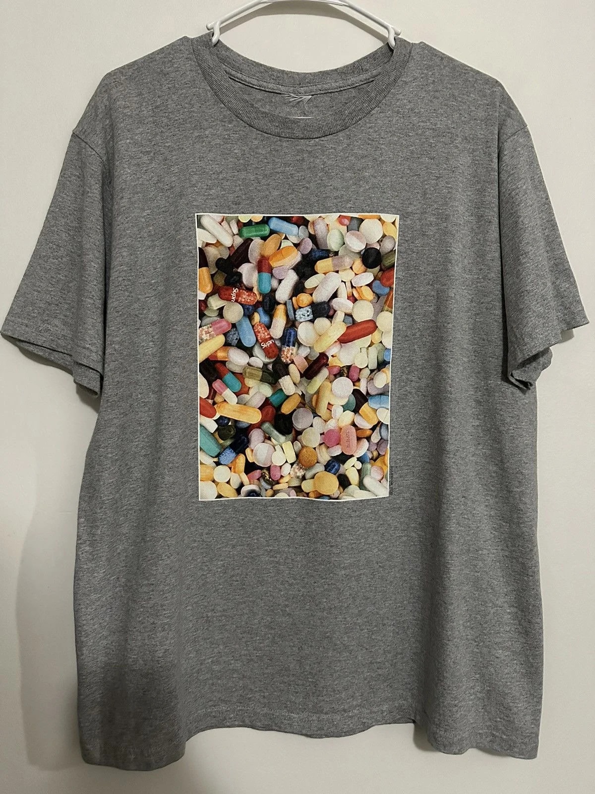 Supreme — Supreme Pills Tee — streetwear — resale