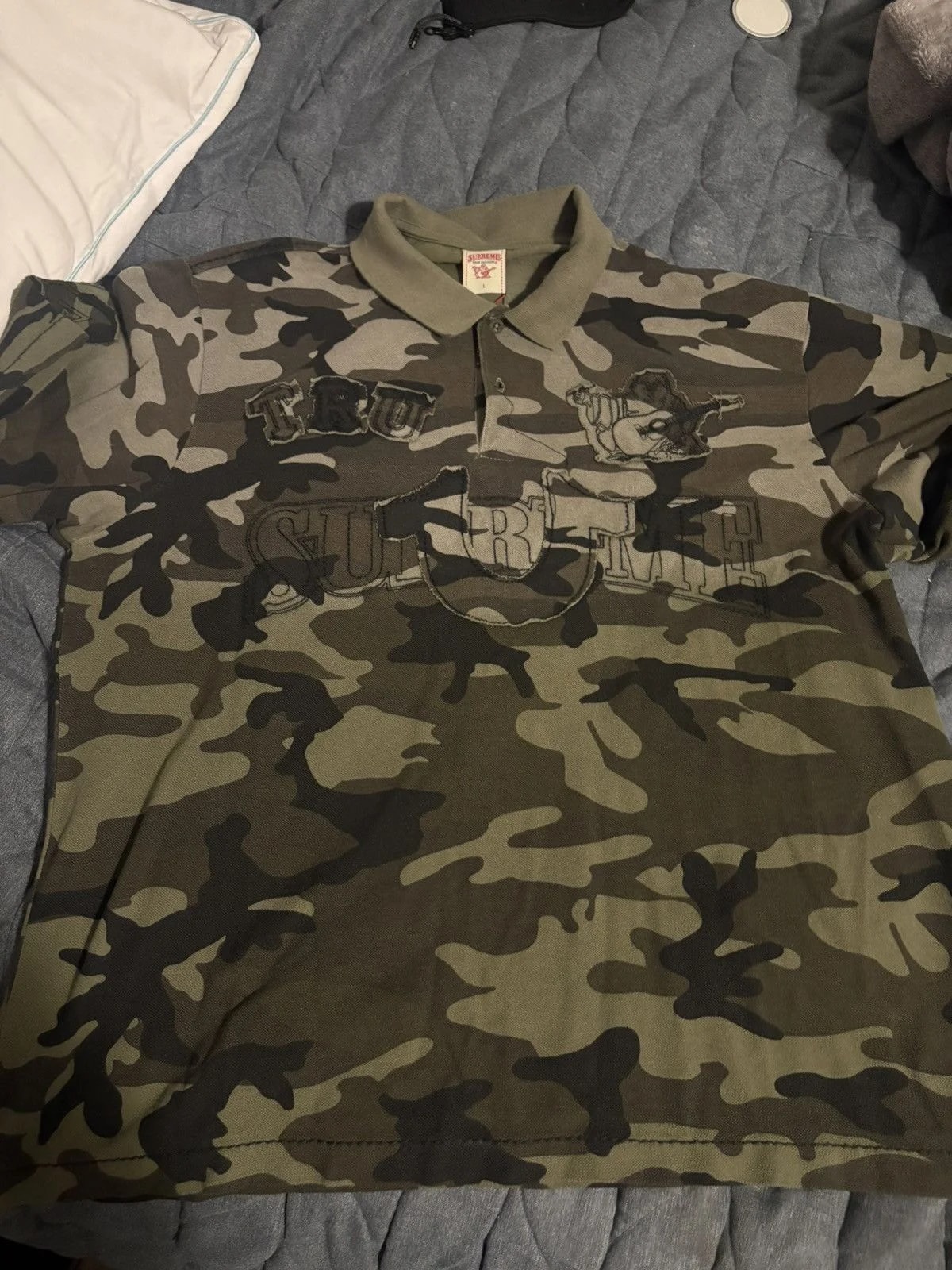 Supreme — Supreme True Religion Camo Polo — streetwear — resale