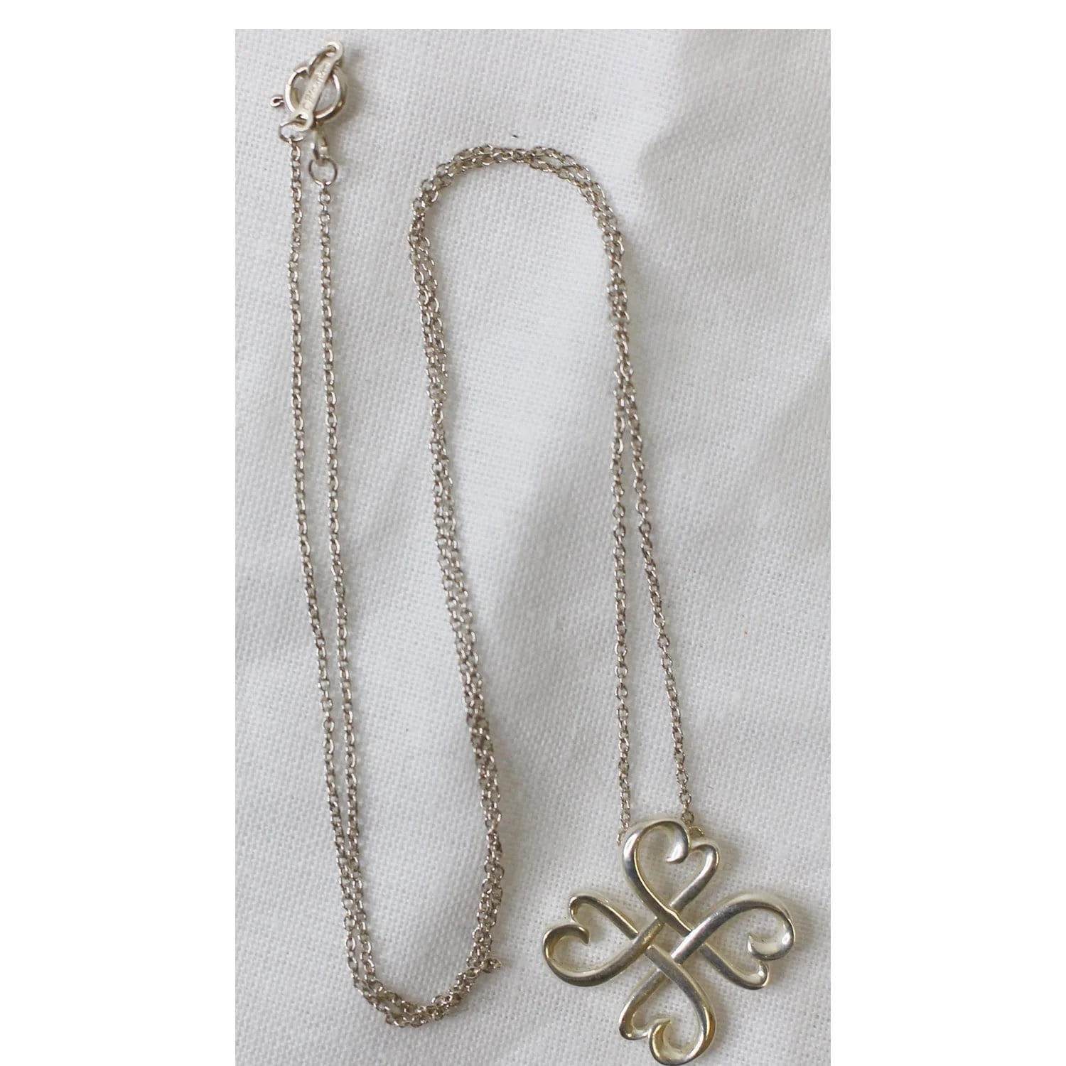 Tiffany & Co. — Tiffany & CO Loving Four Heart Clover Pendant - Last Call — Accessory — resale