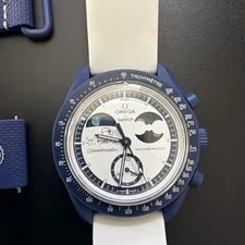 Swatch X Omega — Swatch X Omega Mission TO Earthphase - Moonshine Gold — Watch — resale