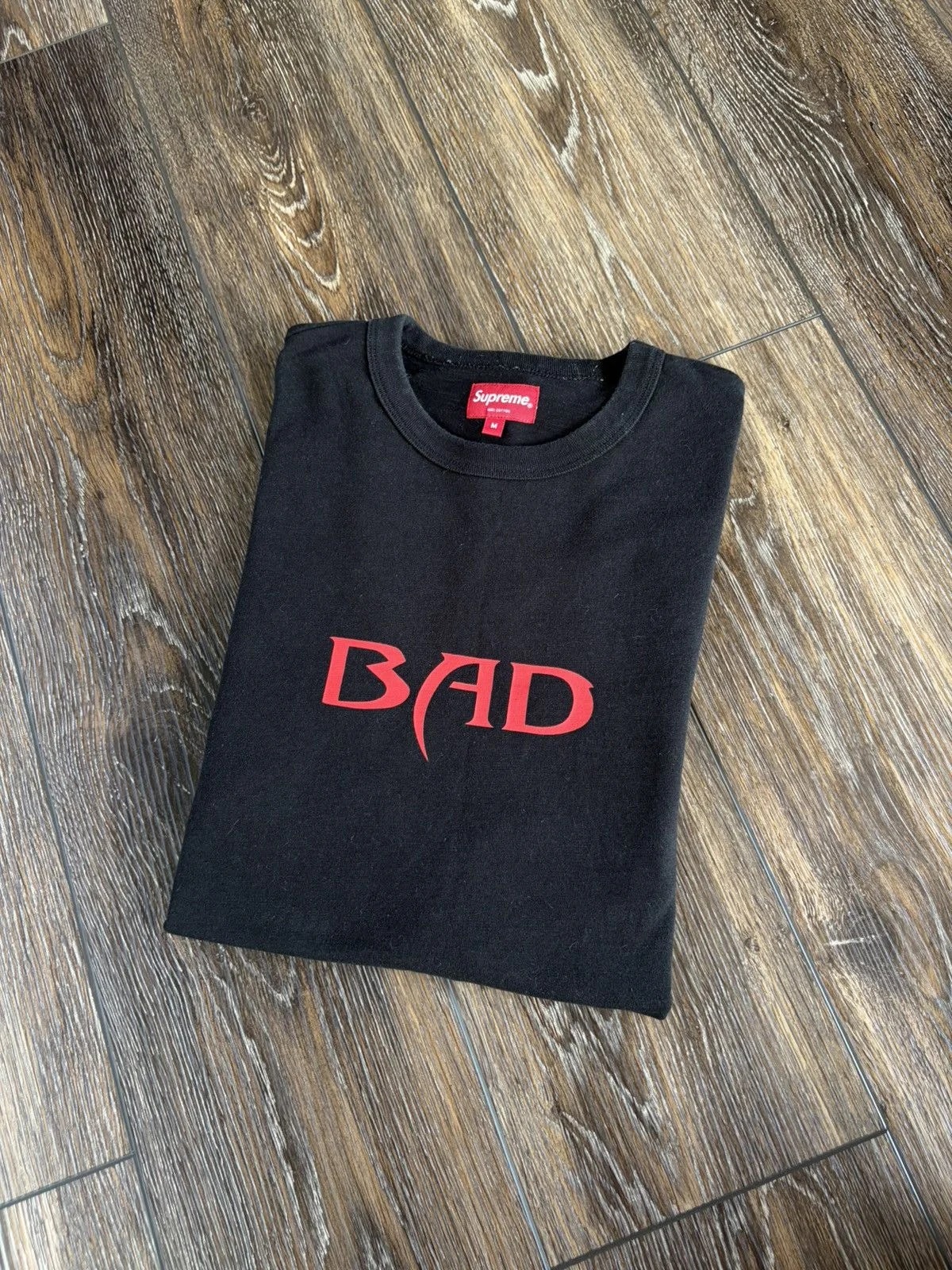 Supreme — Supreme Bad S/S Top — streetwear — resale