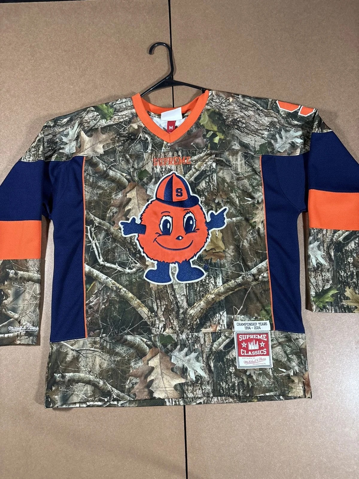 Supreme — Supreme X Mitchell & Ness Hockey Camo — streetwear — resale