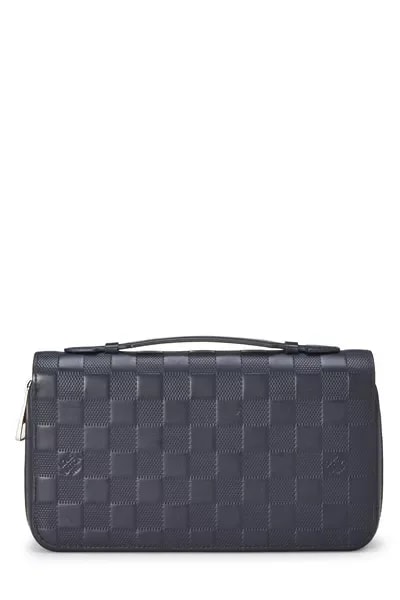 Louis Vuitton — Infini Zippy — Accessory — deal