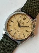 Rolex — Rolex Oyster Perpetual Ref 6564 Tropical Dial — Watch — resale