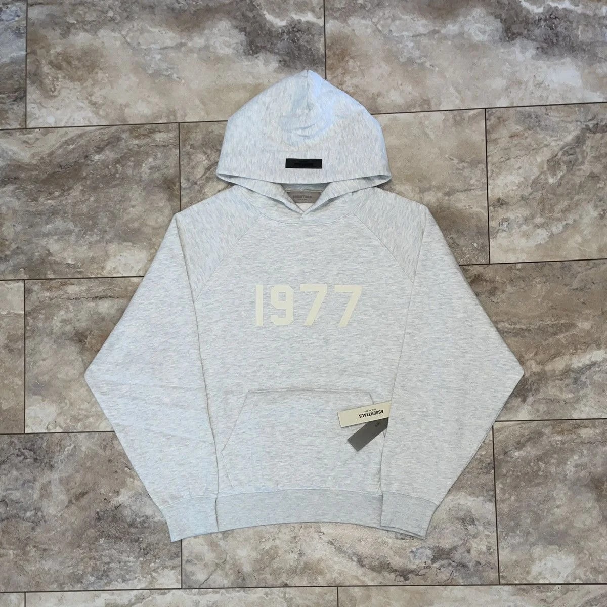 Fear of God — Fear of God Essentials 1977 Hoodie Light — streetwear — resale