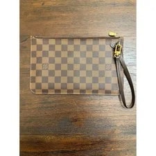 Louis Vuitton — Louis Vuitton Neverfull Wristlet — Handbag — resale