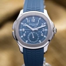 Patek Philippe — Patek Philippe Aquanaut Travel Time White Gold Blue Dial 5164G-001 Complete Set — Watch — resale