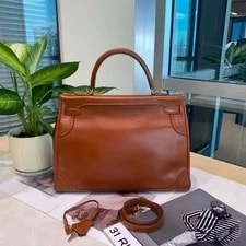 Hermès Kelly 35 Lace Detail Top Handle 2
