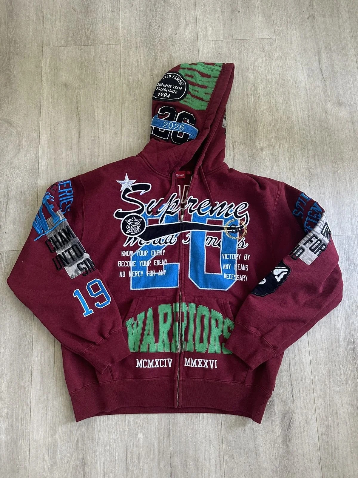 Supreme — Supreme Warriors Applique Hooded Zip Up Sweatshirt Cardinal — streetwear — resale