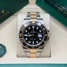 Rolex — Rolex GMT-Master II Black Dial Two Tone Yellow Gold Black Ceramic Bezel Oyster — Watch — resale