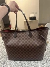 Louis Vuitton — Louis Vuitton Neverfull + Wristlet — Handbag — resale