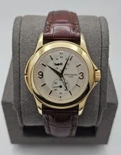 Patek Philippe 5134J Travel Time 37mm 18k Yellow Gold Silver Dial 2
