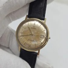Omega — Omega Seamaster Date 14775 Gold Bezel Manual 34MM CAL 610 17J — Watch — resale
