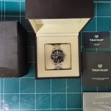 Tag Heuer — Tag Heuer Aquaracer Gugu Quartz 41mm Official — Watch — resale