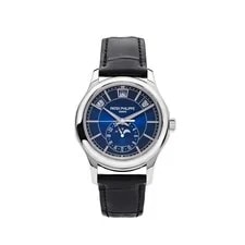 Patek Philippe — Patek Philippe Complications 5205G-013 Annual Calendar White Gold Blue Dial — Watch — resale