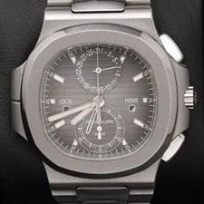 Patek Philippe — Patek Philippe Nautilus Travel Time Chronograph 5990/1A-00 BOX & Paper — Watch — resale