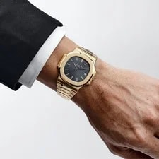 Patek Philippe Nautilus 3700/11J Yellow Gold Black Ribbed Dial 2