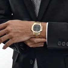 Patek Philippe Nautilus 3700/11J Yellow Gold Black Ribbed Dial 3