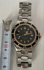 Omega — Omega Seamaster 200M Professional YG Bezel Quartz Working 18K — Watch — resale