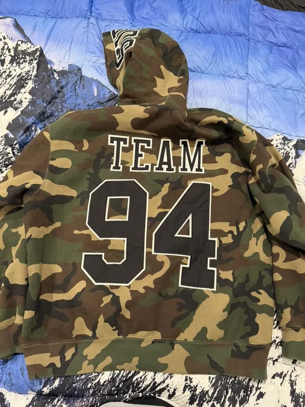 Supreme — Supreme Team 94 Camo Hoodie — streetwear — resale