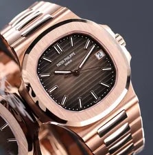 Patek Philippe — Patek Philippe Nautilus 5711/1R Rose Gold 40mm Brown Dial Bracelet Complete Set — Watch — resale