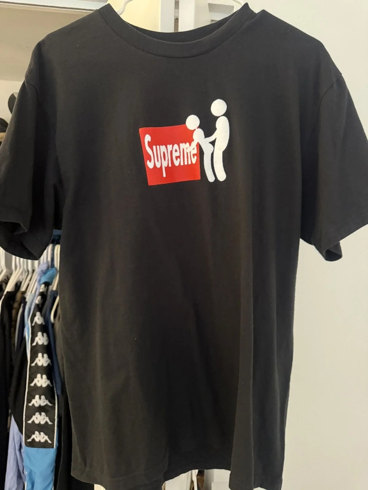 Supreme — Supreme "Stick Figure" Graphic Tee — streetwear — resale