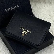 Prada — Good Condition Built in Prada Tri Fold Wallet From J — Handbag — resale
