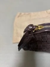 Bottega Veneta Dark Pouch Understated and Timeless Elegance Italy 4
