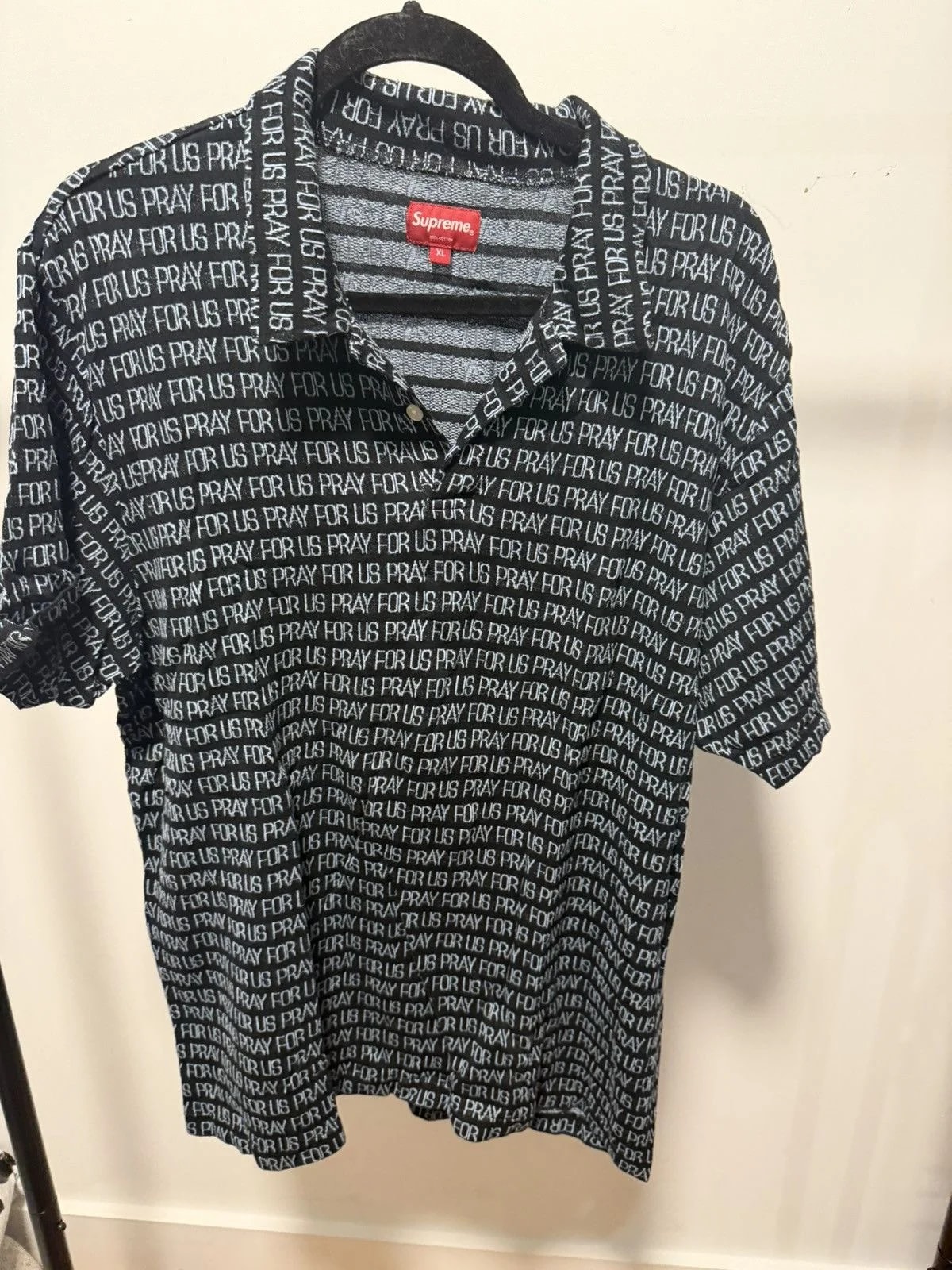Supreme — Supreme ‘Pray for Us’ Polo Shirt — streetwear — resale