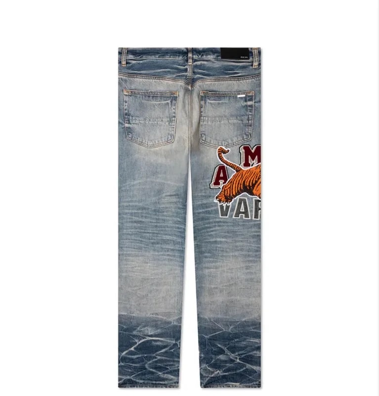 Amiri — Amiri Tiger Varsity Jeans — Clothing — resale