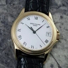 Patek Philippe — Patek Philippe Calatrava 5117J 18K Yellow Gold Automatic Date W/ Deployant — Watch — resale