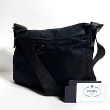 Prada — Prada Camera Crossbody Triangle Logo — Handbag — resale