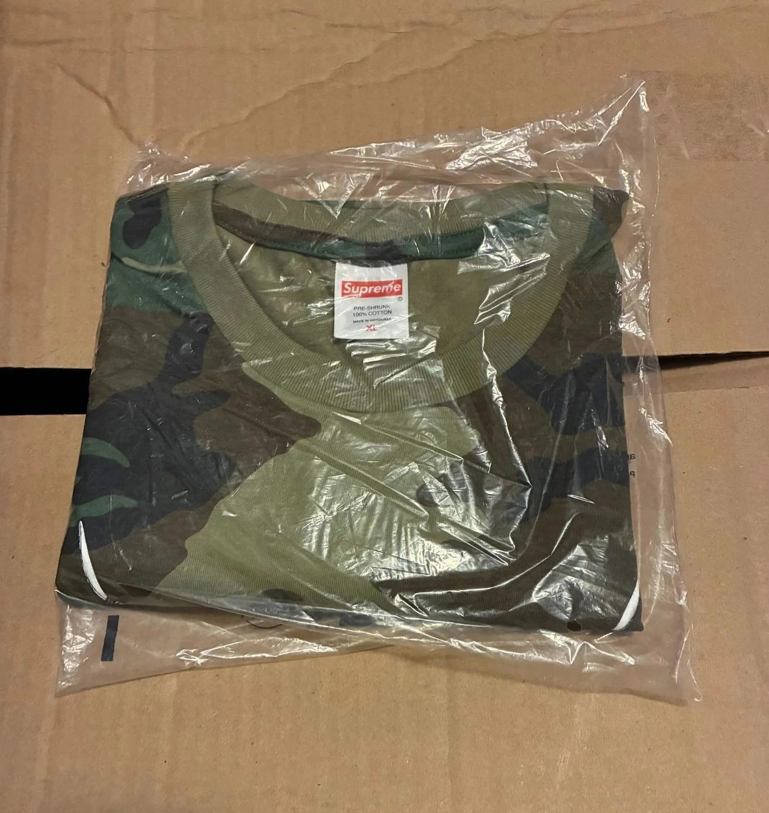 Supreme — Supreme Origami Tee Camo Woodland — streetwear — resale