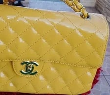 Chanel ’s Flap , Turn Lock, Chain 4