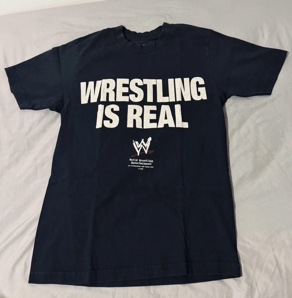 Travis Scott — WWE Wrestling Is Real T-Shirt — streetwear — resale