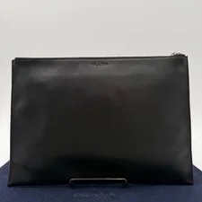 Includes Prada Logo Embossed From 2
