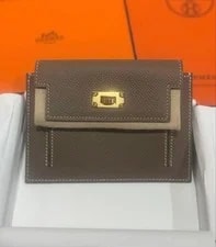 Hermès — Hermes Kelly Pocket Compact Etoupe Epure Unused — Handbag — resale