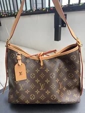 Louis Vuitton — Louis Vuitton Carryall M46203 With Wristlet — Handbag — resale