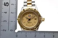 ▶️ [N ] TAG Heuer Professional 2000 964.008-2 Gold Dial Quartz 4
