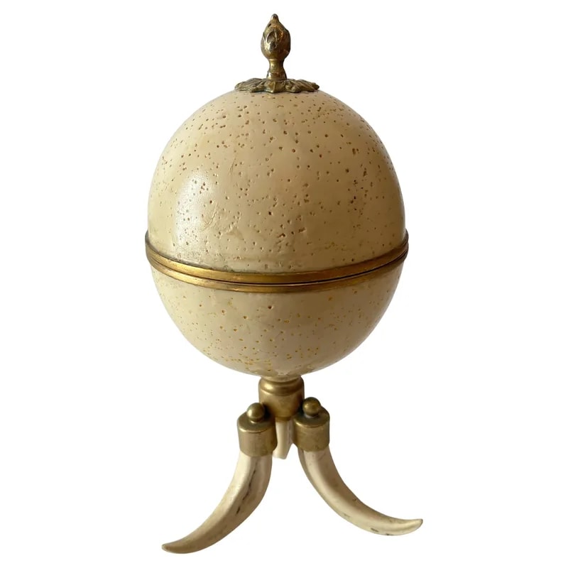 Ostrich Egg with Brass Closures and Tusk Feet in the Style of J. Antony Redmile — Furniture — resale