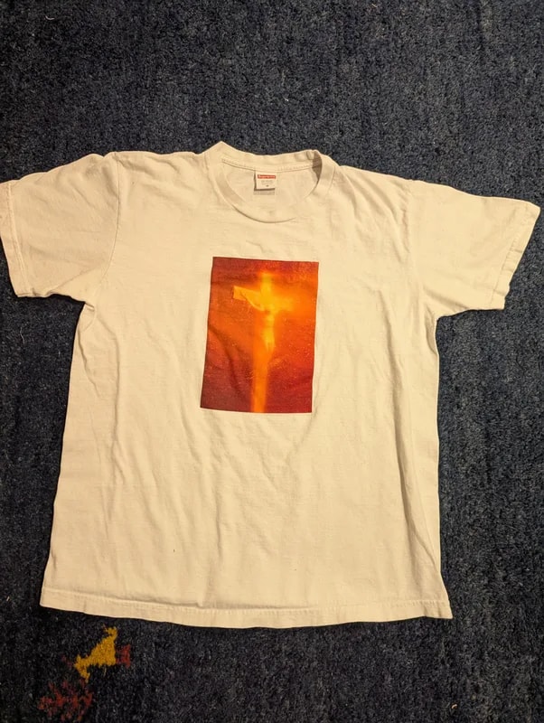 Supreme — Supreme X Andres Serrano Piss Christ Tee — streetwear — resale