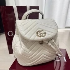 Gucci — Unused Gucci GG Marmont Matelasse Mini Chain Backpack 598594 — Handbag — resale