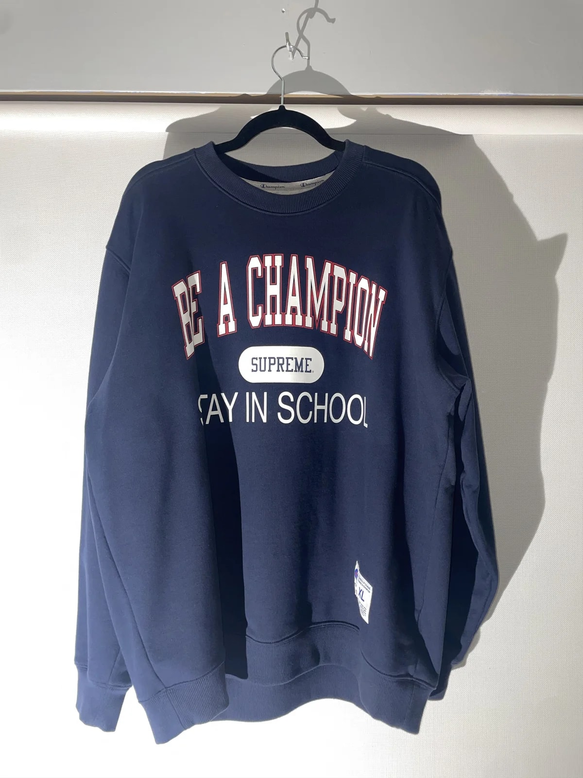 Supreme — Supreme Champion Stay in School Crewneck — streetwear — resale
