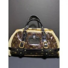 Louis Vuitton — Louis Vuitton Storm Clasp From Japan — Handbag — resale